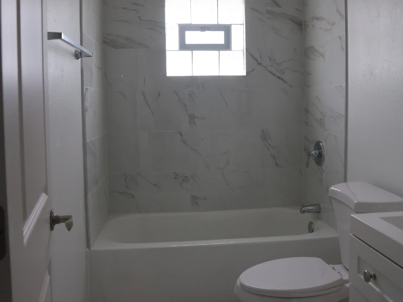 Updated bathroom with light tile