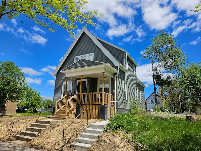 Exterior of completed home project with gray walls