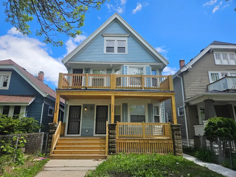 Exterior of completed home project with new porch