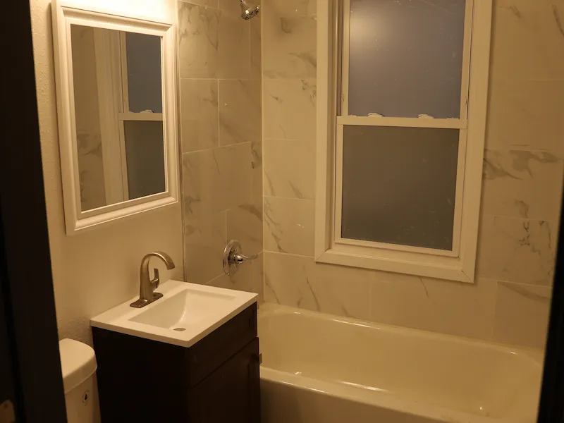 Updated bathroom with light tile